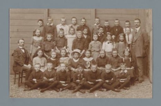 Group portrait of children and (presumably) teachers