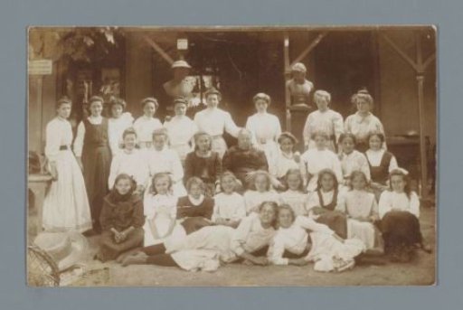 Group portrait of children and unknown women