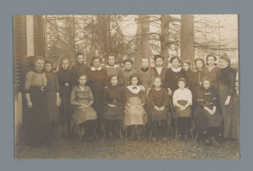 Group portrait of children and unknown women