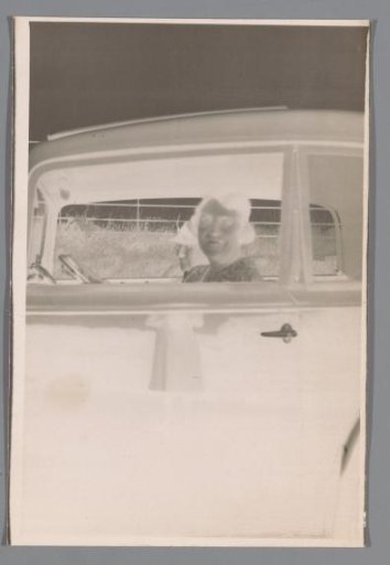 Two unknown women in a car
