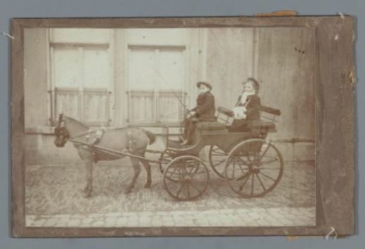 Two Children on a Horse-Drawn Carriage in Front of a Residence (Probably) in The Hague