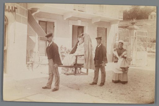 Woman being carried in a sedan chair to go bathing