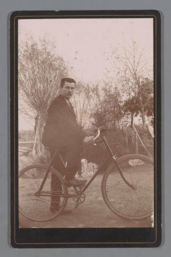 Portrait of an Unknown Man with a Bicycle