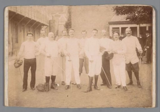Group portrait of unknown men in fencing attire