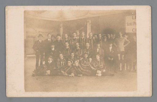 Group portrait of hockey players on roller skates