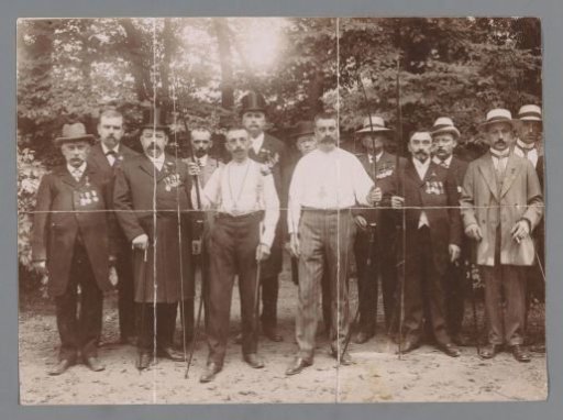Portrait of two unknown men with bow and arrow with (possibly) jury members