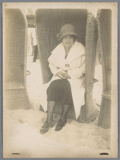 Portrait of an unknown woman in a beach chair on a beach