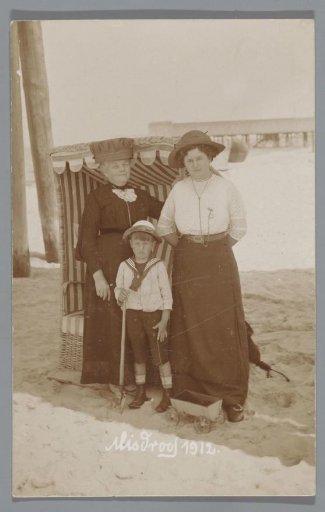 Portrait of an unknown grandmother, mother and grandson on the beach in Międzyzdroje