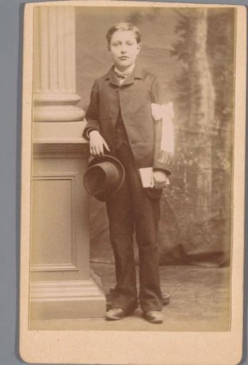 Portrait of an Unknown Boy Dressed in a Suit for First Holy Communion