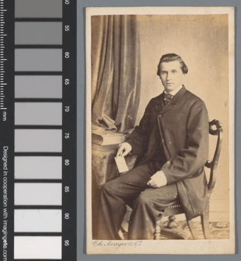 Portrait of an unknown man with a visiting card in his hand