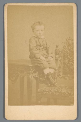 Portrait of an Unknown Boy, Sitting on a Table