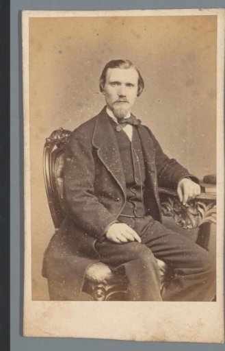 Portrait of an Unknown Man, Sitting at a Table