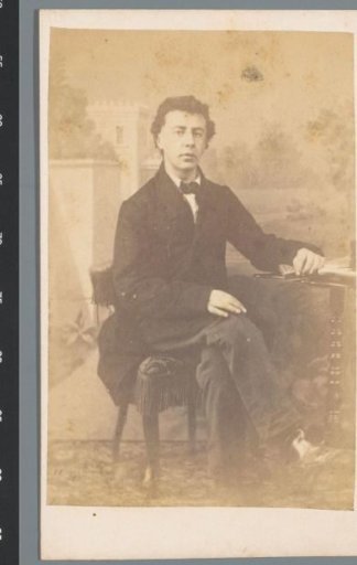 Portrait of an unknown man, seated at a table