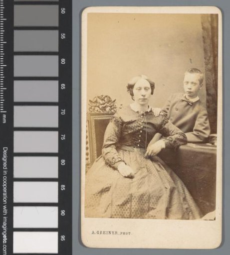 Portrait of an unknown woman and an unknown child around a table