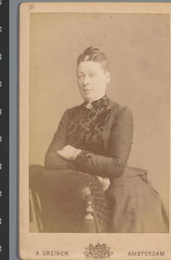 Portrait of an unknown woman, leaning on a chair