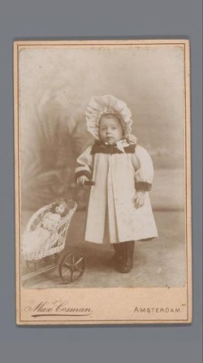Portrait of an Unknown Child with a Doll's Pram