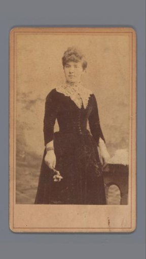 Portrait of an Unknown Woman with a Flower in Her Hand