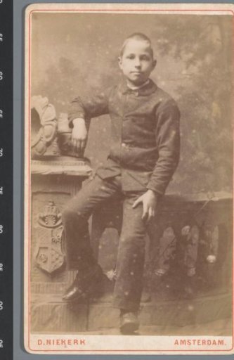 Portrait of an unknown boy on a balustrade