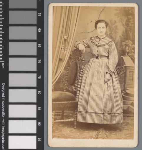 Portrait of an unknown woman in a striped dress