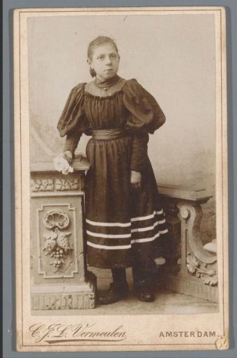 Portrait of an unknown girl with a rose