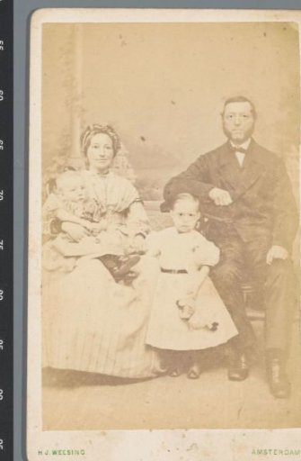 Group portrait of an unknown man, woman and two children