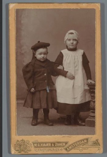 Portrait of two unknown children in traditional dress