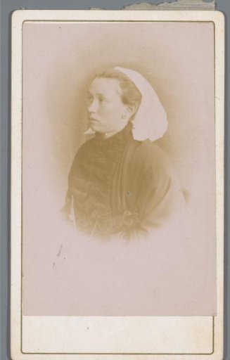 Portrait of an unknown woman with headgear