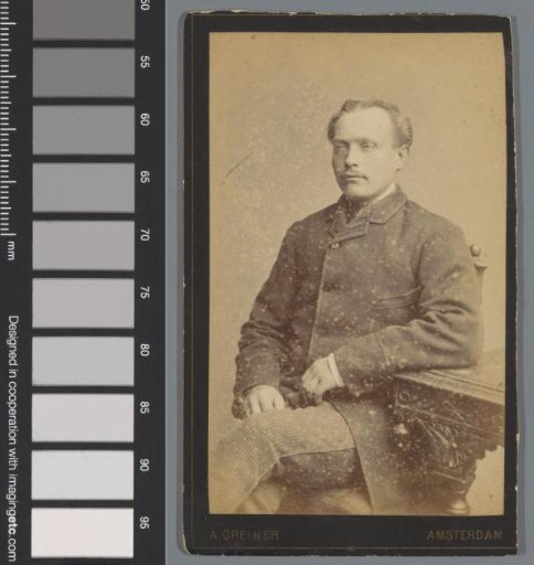 Portrait of an unknown man at a table