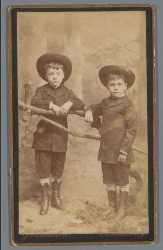 Portrait of two unknown boys with hats