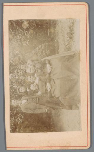 Group portrait of five unknown women and two men