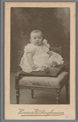 Portrait of an unknown baby on a cushion