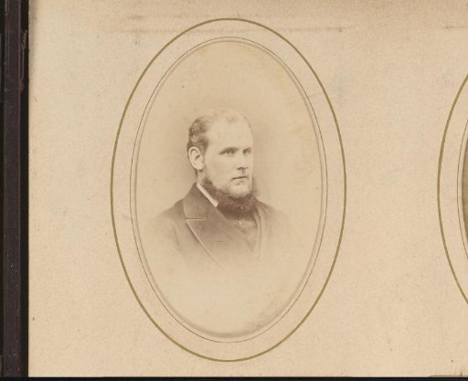 Portrait of a man with a ring beard