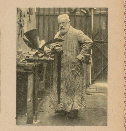 Portrait of Fernand Forest at a workbench