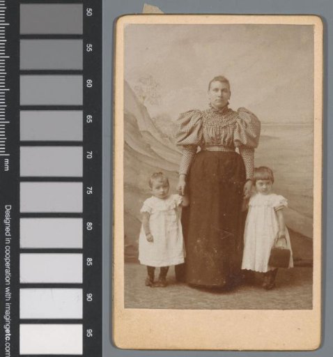 Portrait of an unknown woman with two girls