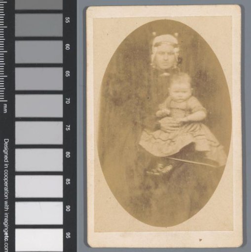 Portrait of Dieuwertje Kalff with a baby on her lap