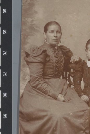 Portrait of an unknown woman and an unknown girl with a doll