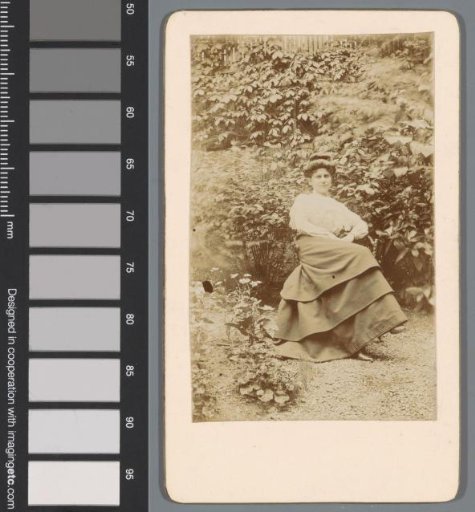 Portrait of an unknown woman in a garden
