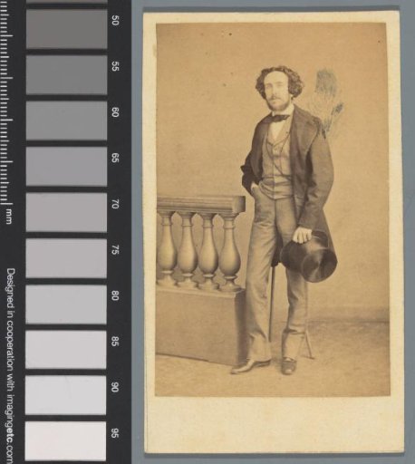 Portrait of an unknown man with hat at a balustrade
