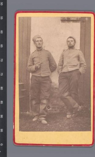 Portrait of two unknown young men in uniform