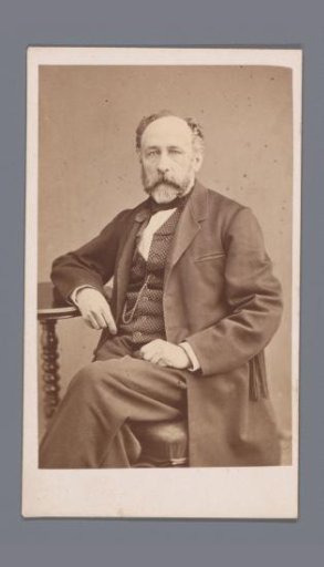 Portrait of an unknown man at table