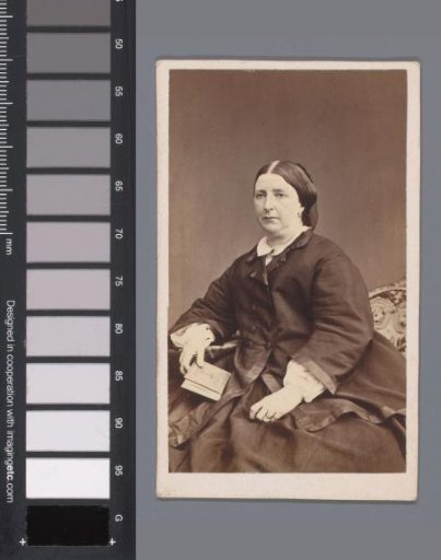 Portrait of an unknown seated woman with a book in her hand