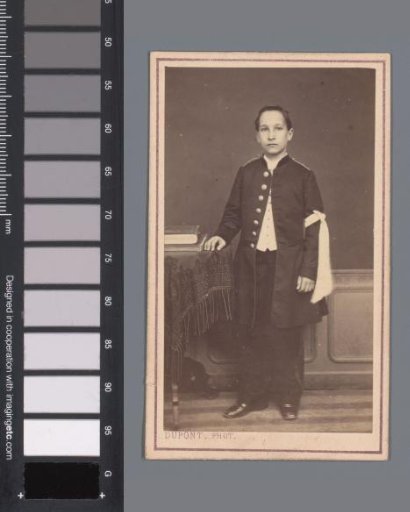 Portrait of an unknown boy with a ribbon around his arm