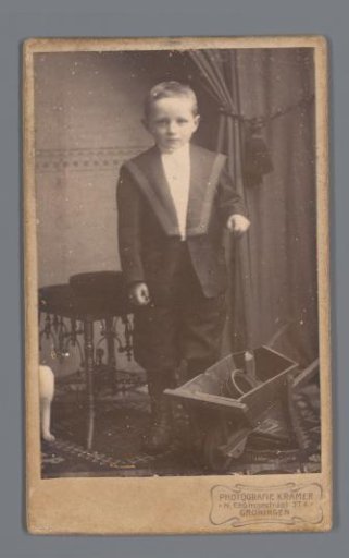 Portrait of an Unknown Boy with a Wheelbarrow