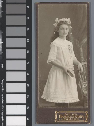 Portrait of an Unknown Girl with a Floral Wreath