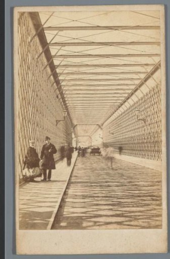 Pedestrians and carriages on the Cathedral Bridge in Cologne
