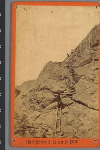 Figures climbing a rock face near Grindelwald