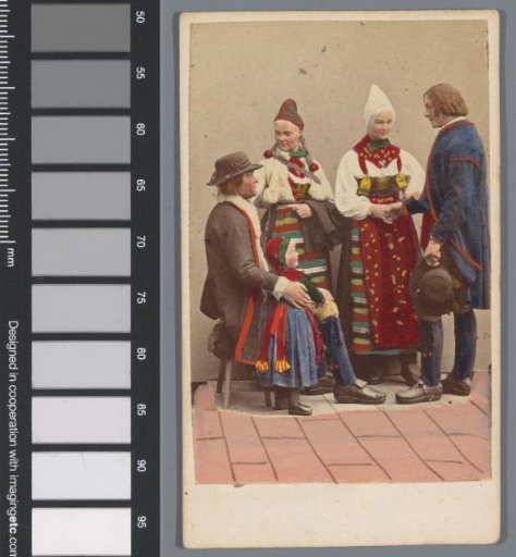 Group portrait of five people in costume from Rättvik, Sweden