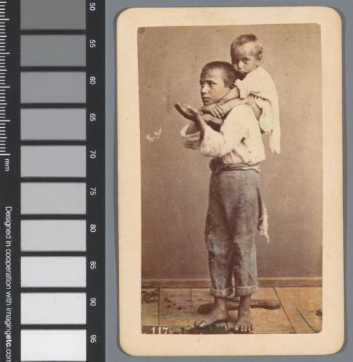 Portrait of two unknown young beggars