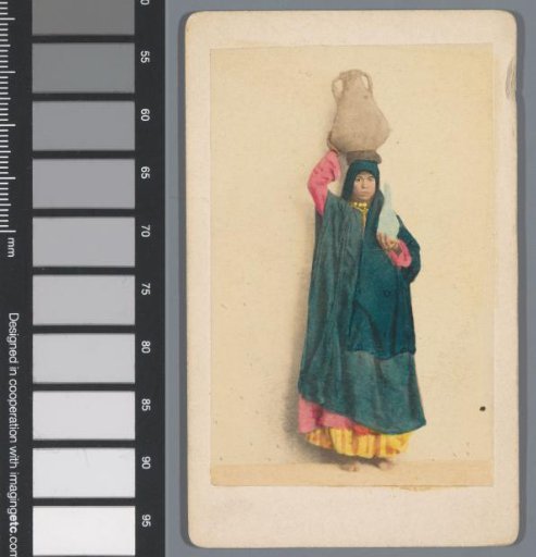 Portrait of an unknown Egyptian woman with a water jug on her head