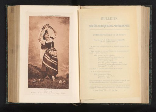 Portrait of an Unknown Young Woman in Traditional Dress with Tambourine